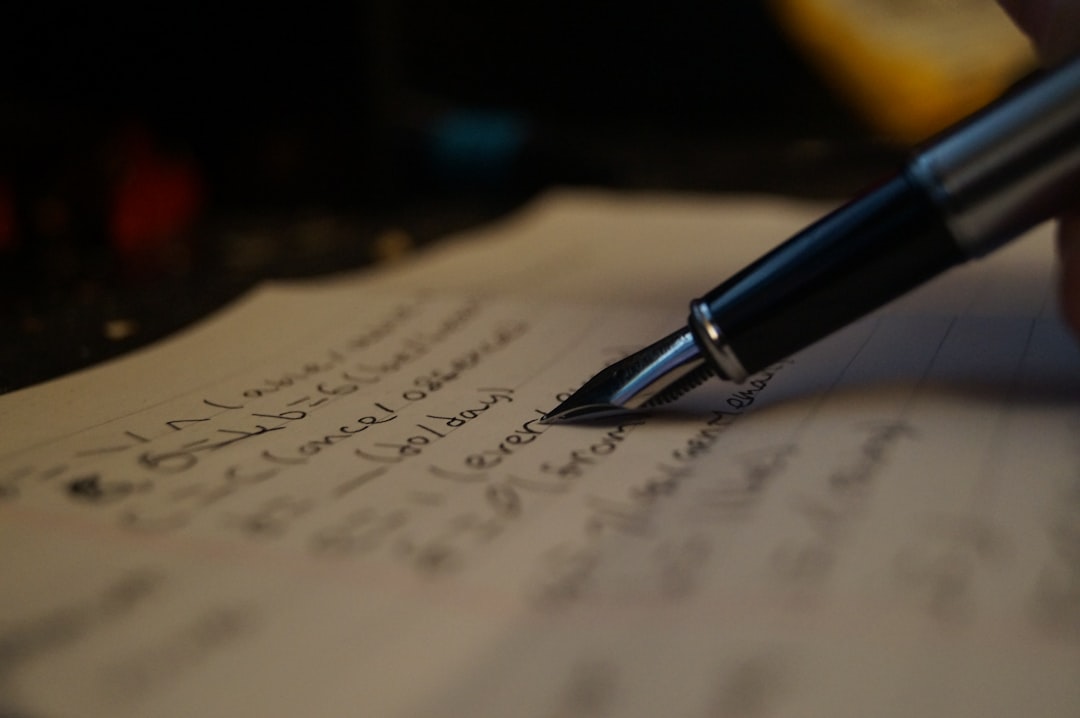 Fountain pen writing complex notes on paper