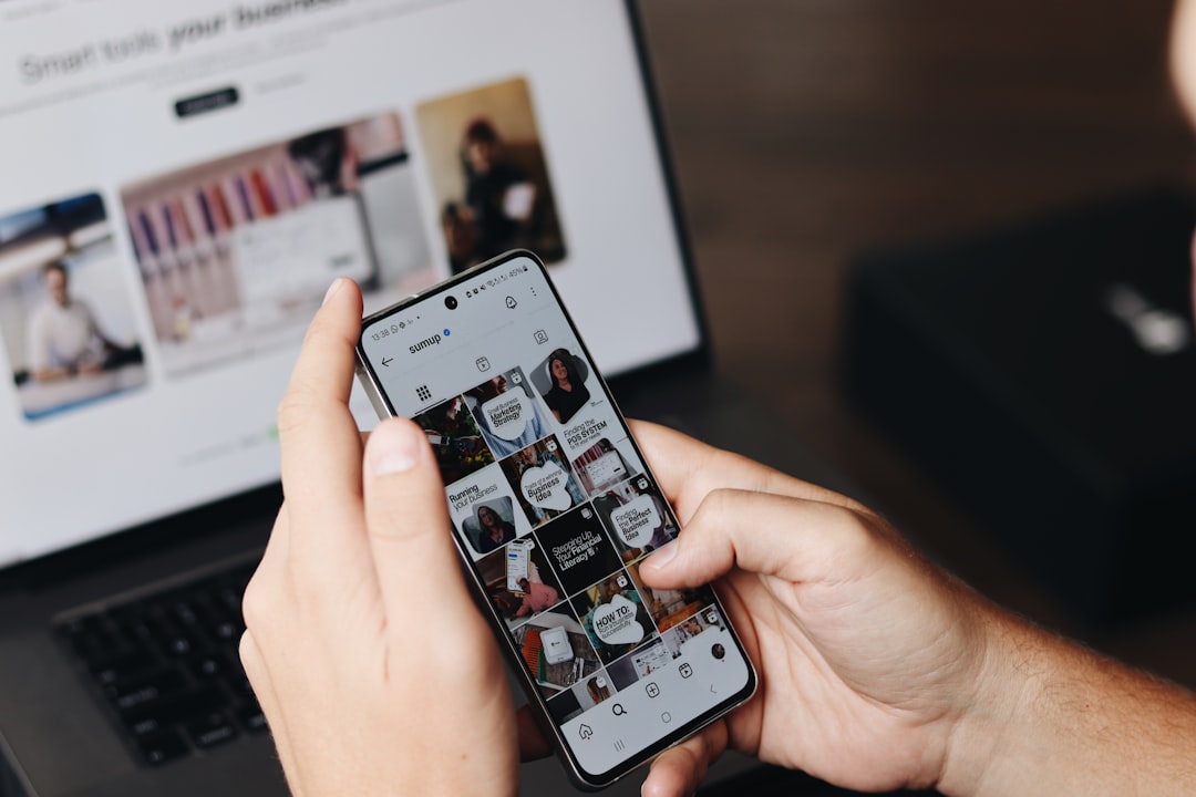Person browsing social media on smartphone