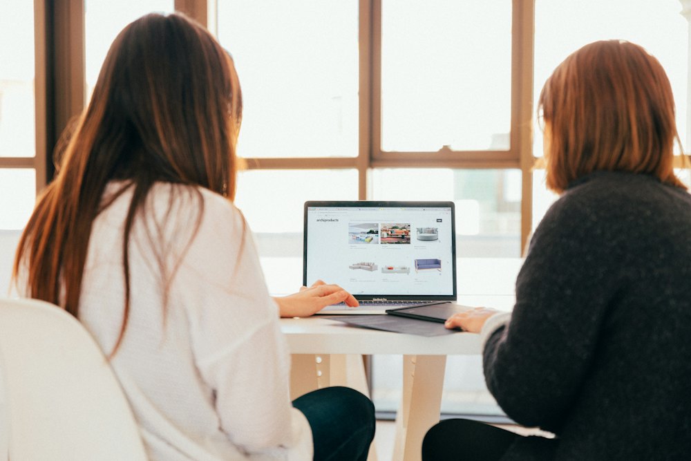 Strategist and editor reviewing a draft together